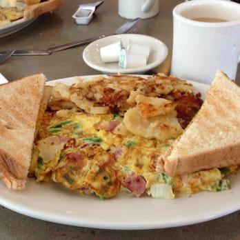 Mountain View Diner signature dishes Spanish Omelette
Breaded Chicken Parmigiana
Sea Scallops
